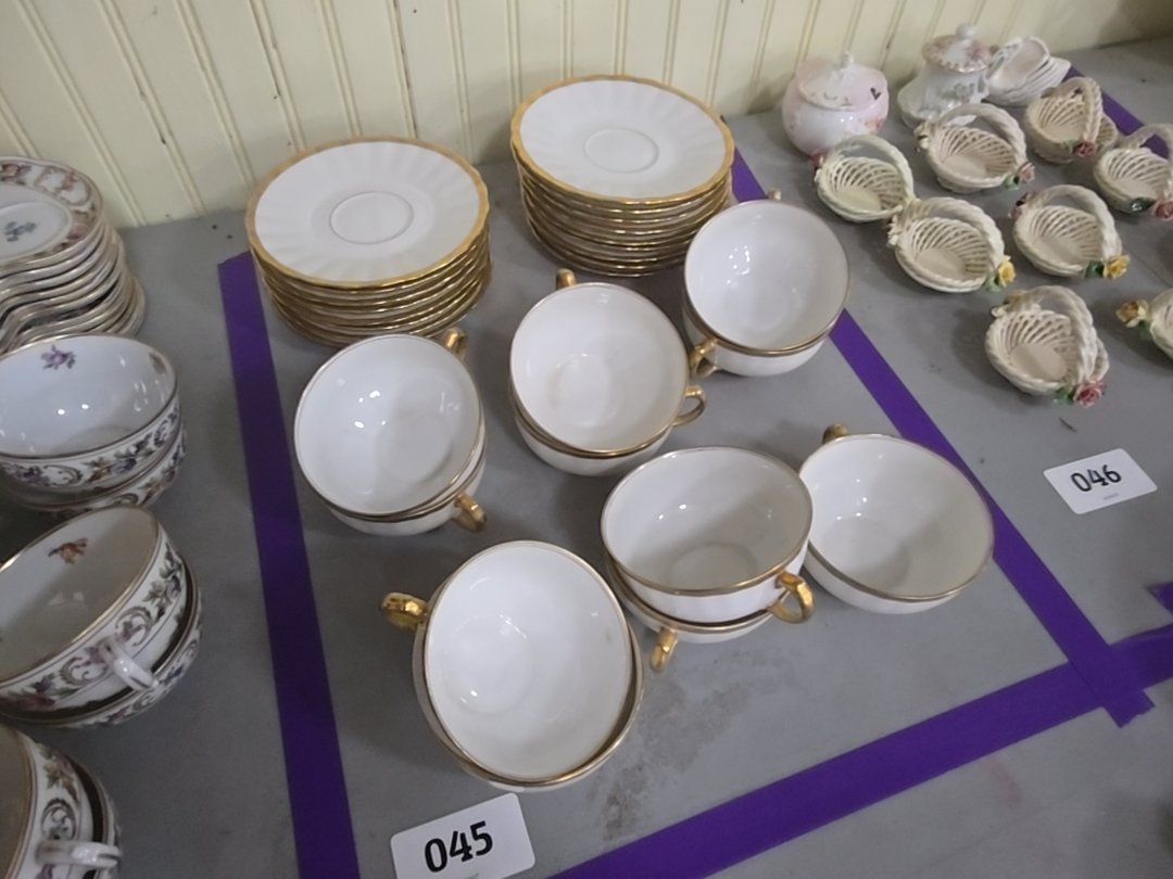grouping of 11 France Bawo and dotter Elite Works cups and saucers