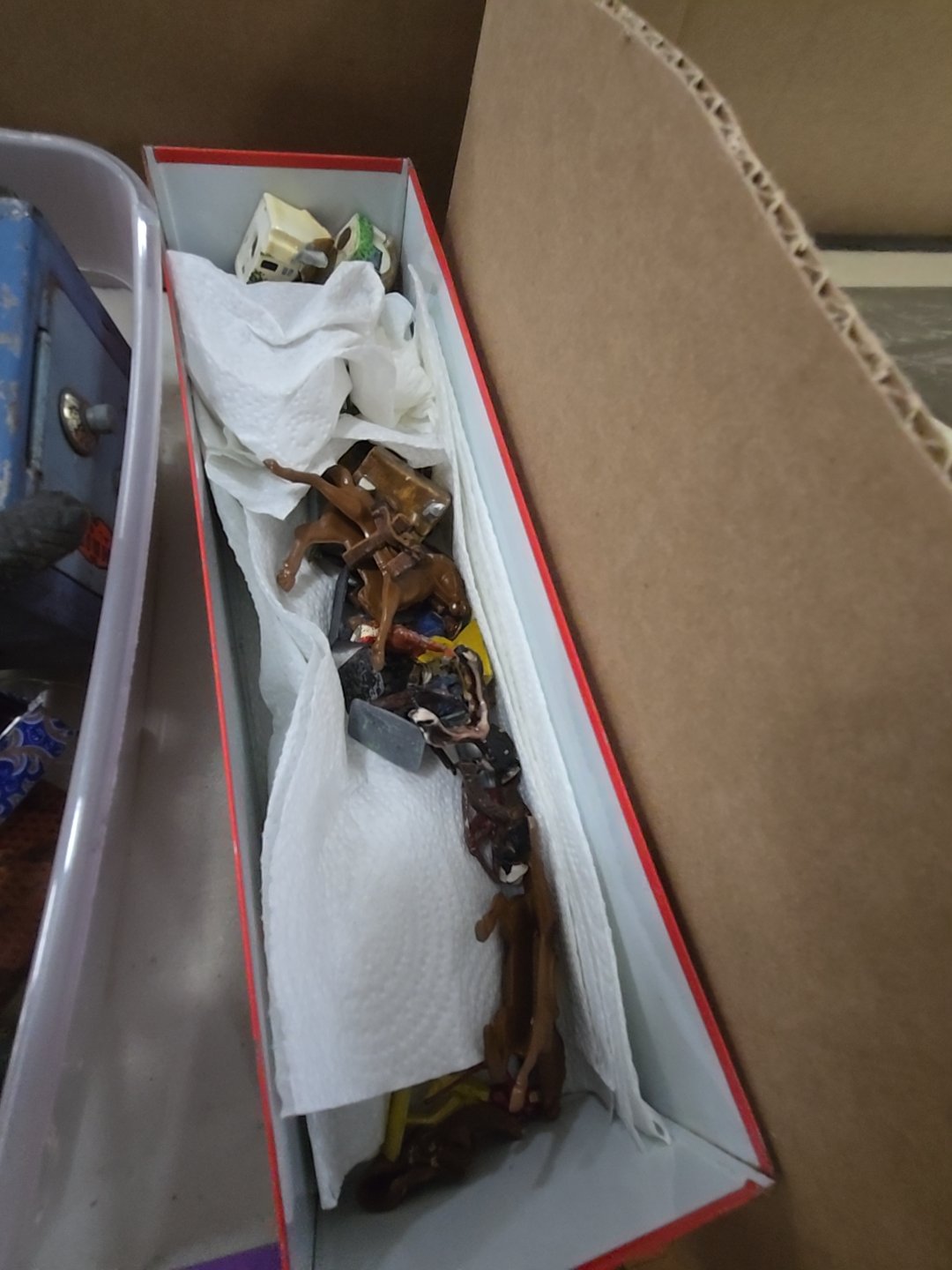 box lot of toy soldiers