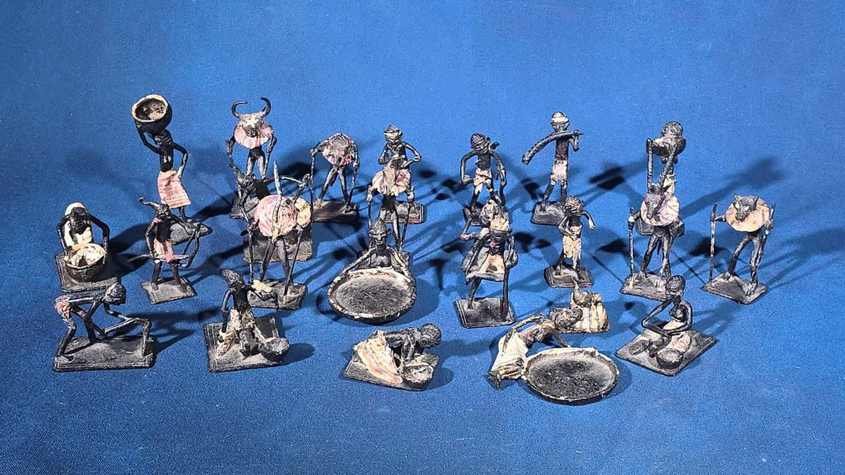Grouping of 24 Vintage West African Iron Figurines with Painted Details and Provenance Note