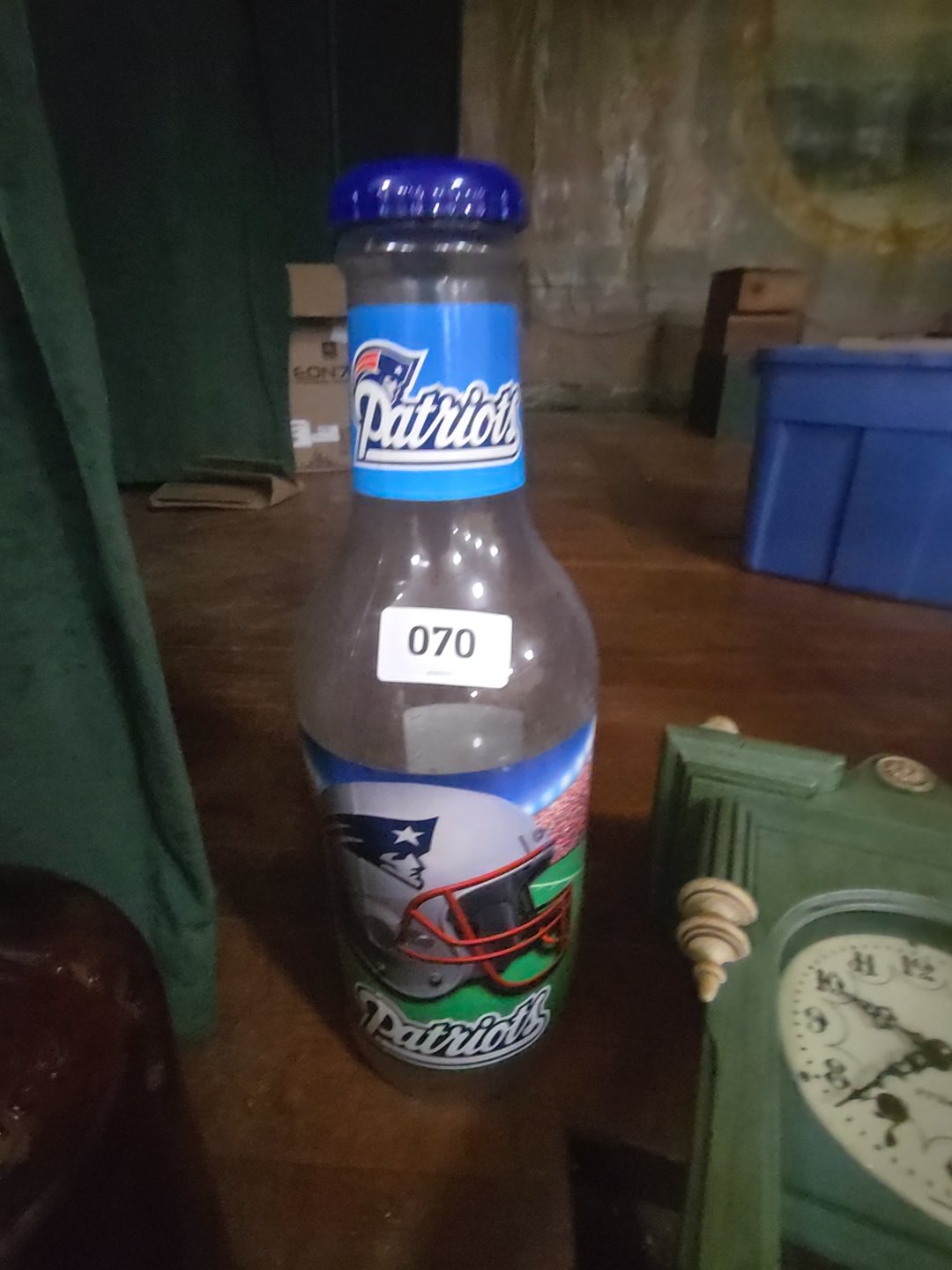 oversized plastic Patriots Bank bottle