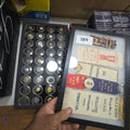 Lot 189 - Pair of Riker Cases with Ribbons and Buttons