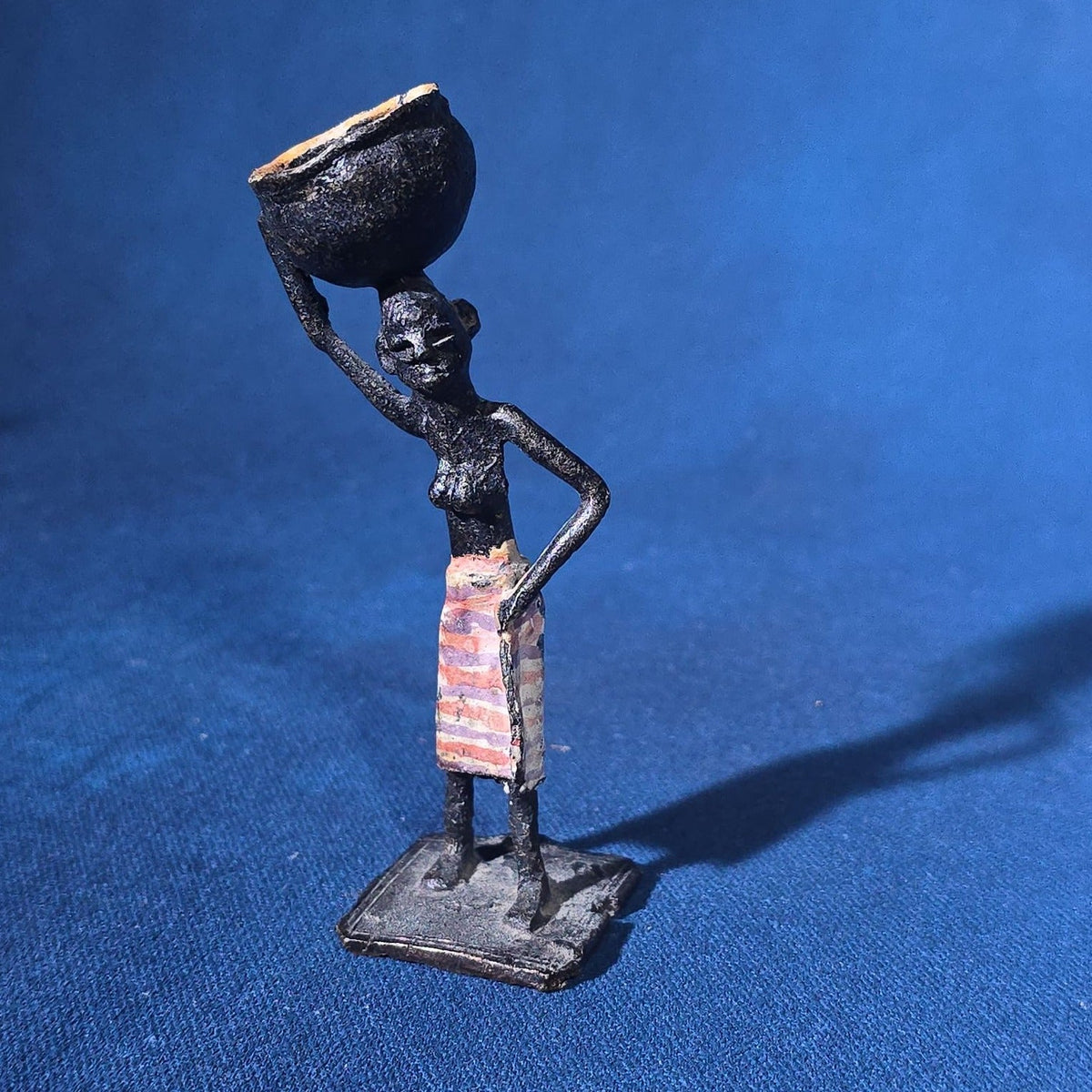 Grouping of 24 Vintage West African Iron Figurines with Painted Details and Provenance Note