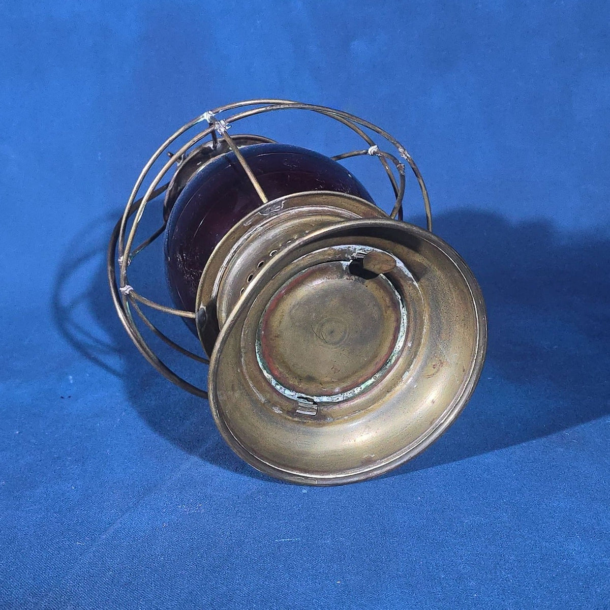 Antique Brass Lantern with Red Globe and Wire Cage Guard