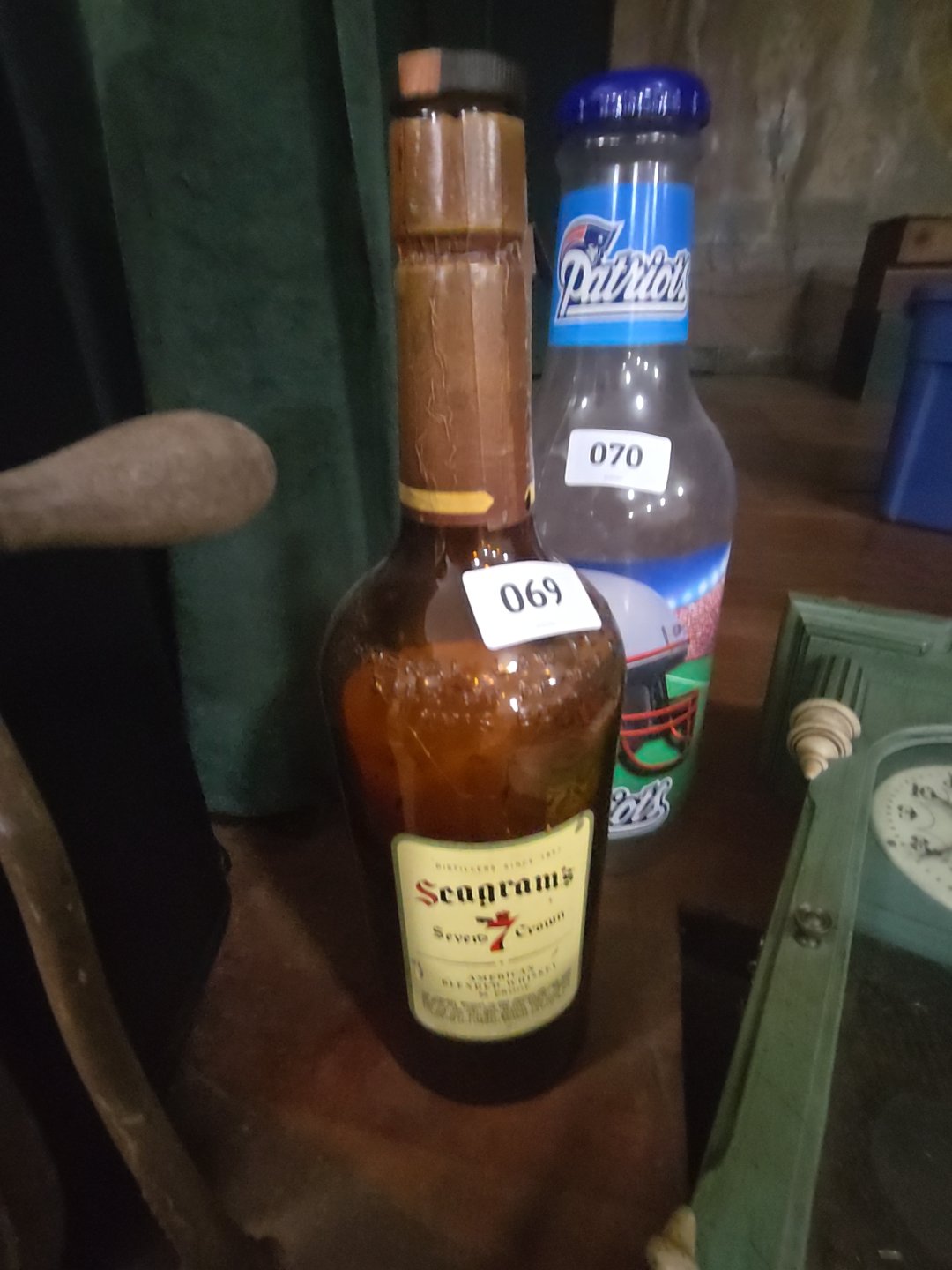 oversized Seagram's bottle, cracked