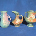 Lot 128 - Trio of Vintage Roseville Pottery Pieces Including Foxglove Vase 44-6", White Rose Ewer 981-6", and White Rose Vase 146-6", Chips to All Three