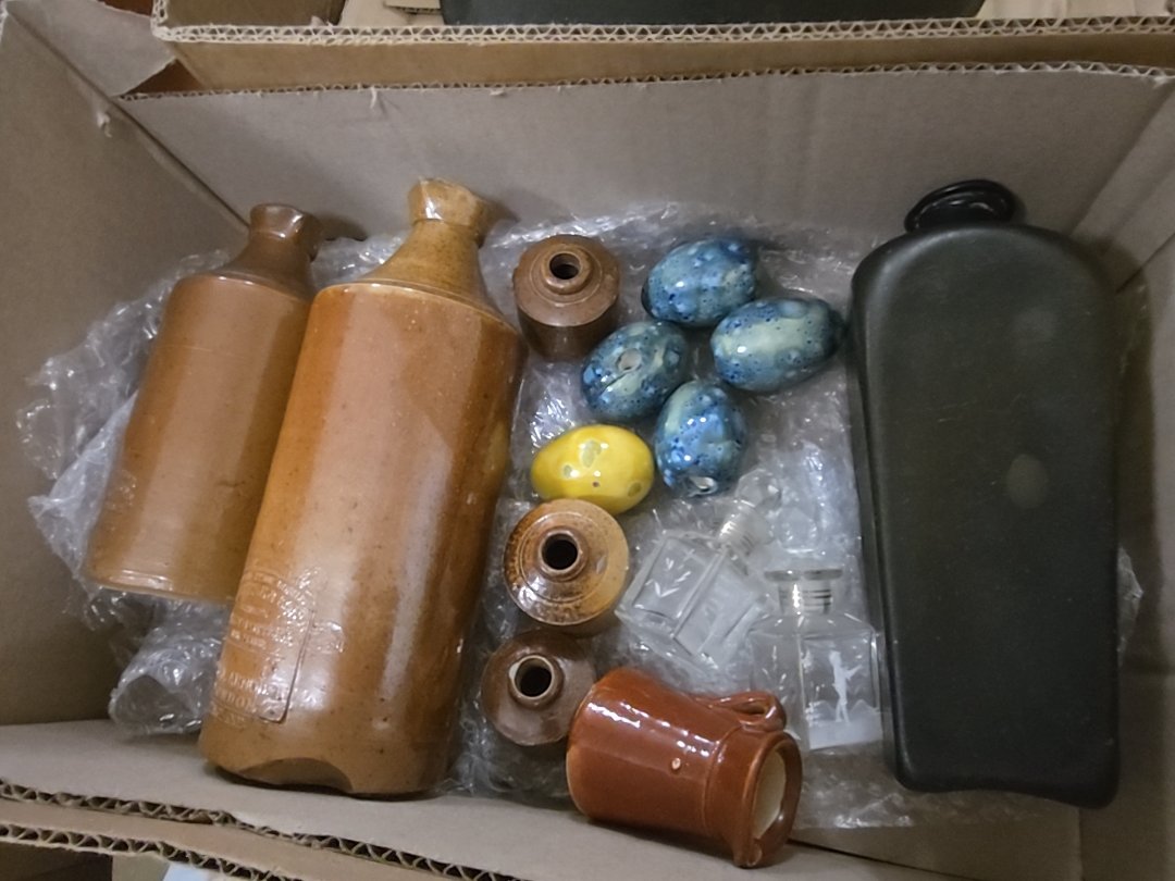 box lot with bottles and eggs