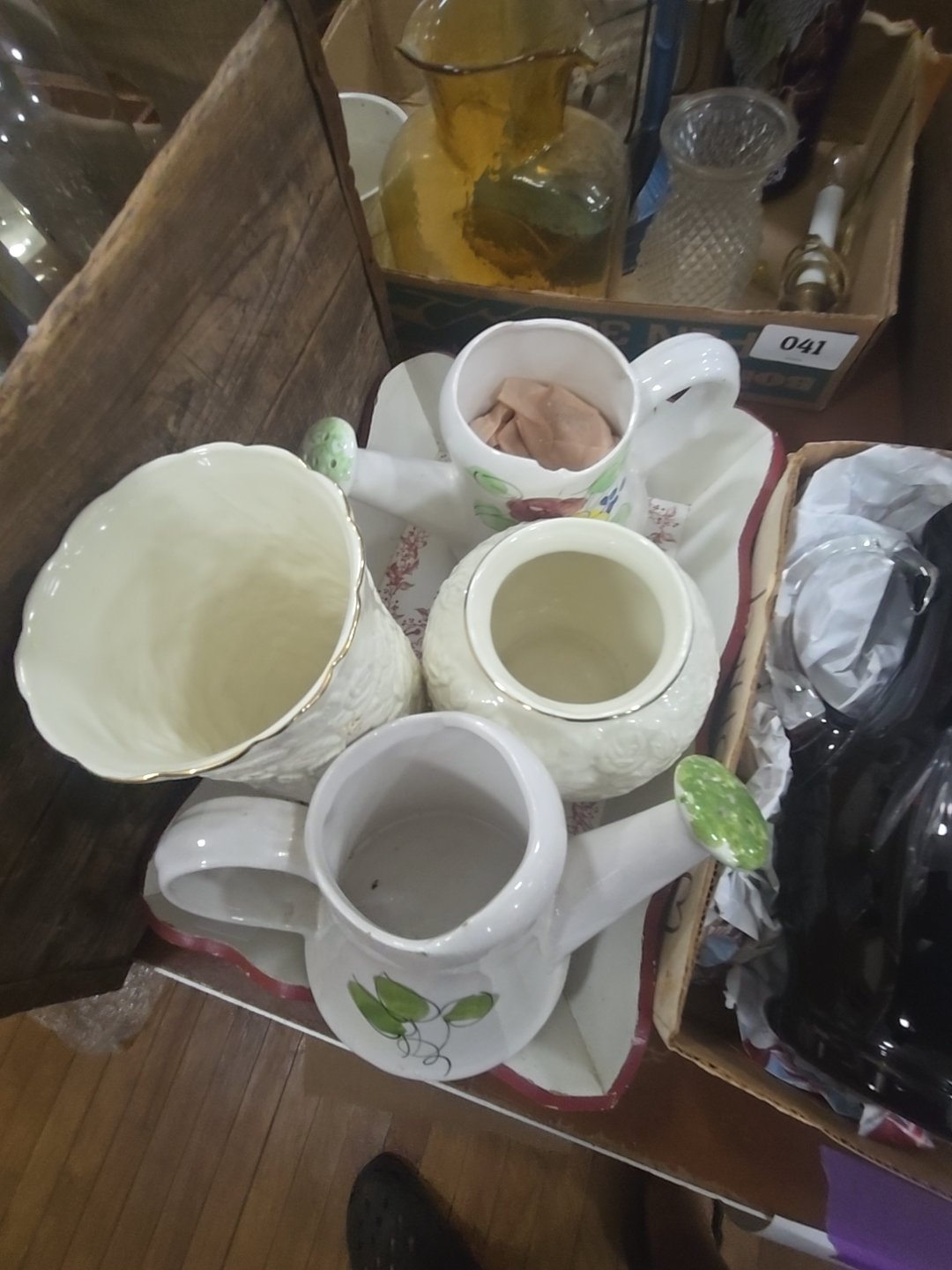trailer of of pottery including chipped watering pail