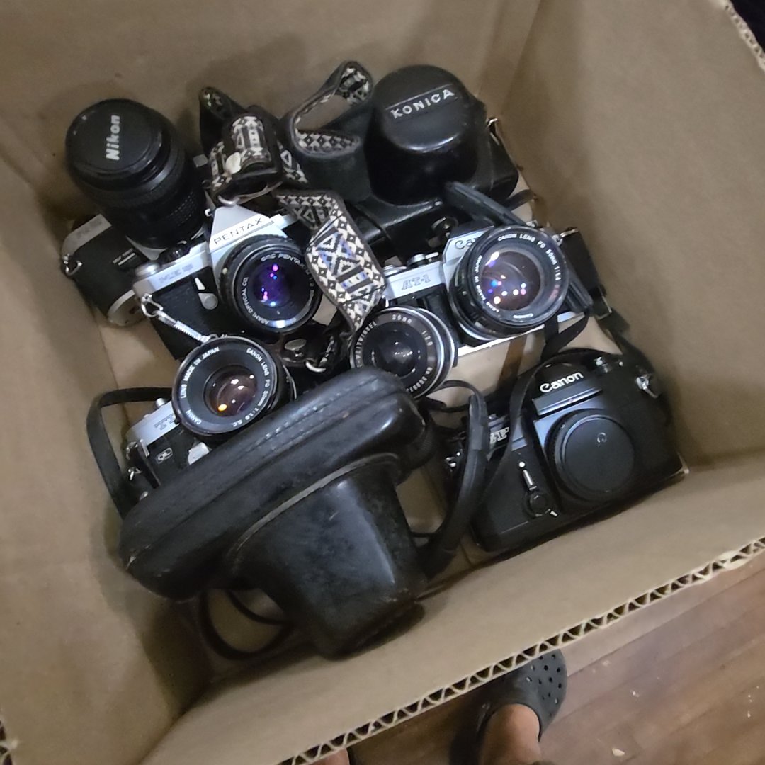 box lot with 35 mm cameras