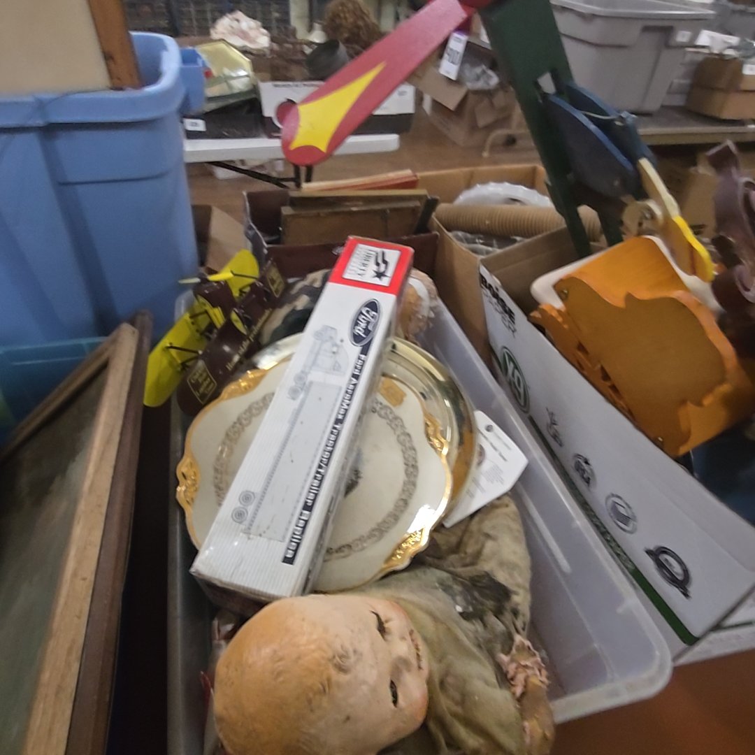 box lot with old dolls, plates, clock, and more