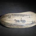Lot 001 - Antique Scrimshaw Whale Tooth Engraved with "South Eastern View Nantucket, Mass 1838" Harbor Scene, Town Waterfront, Sailing Vessels, Church Steeples, and Horse-Drawn Cart, 8-1/4" L