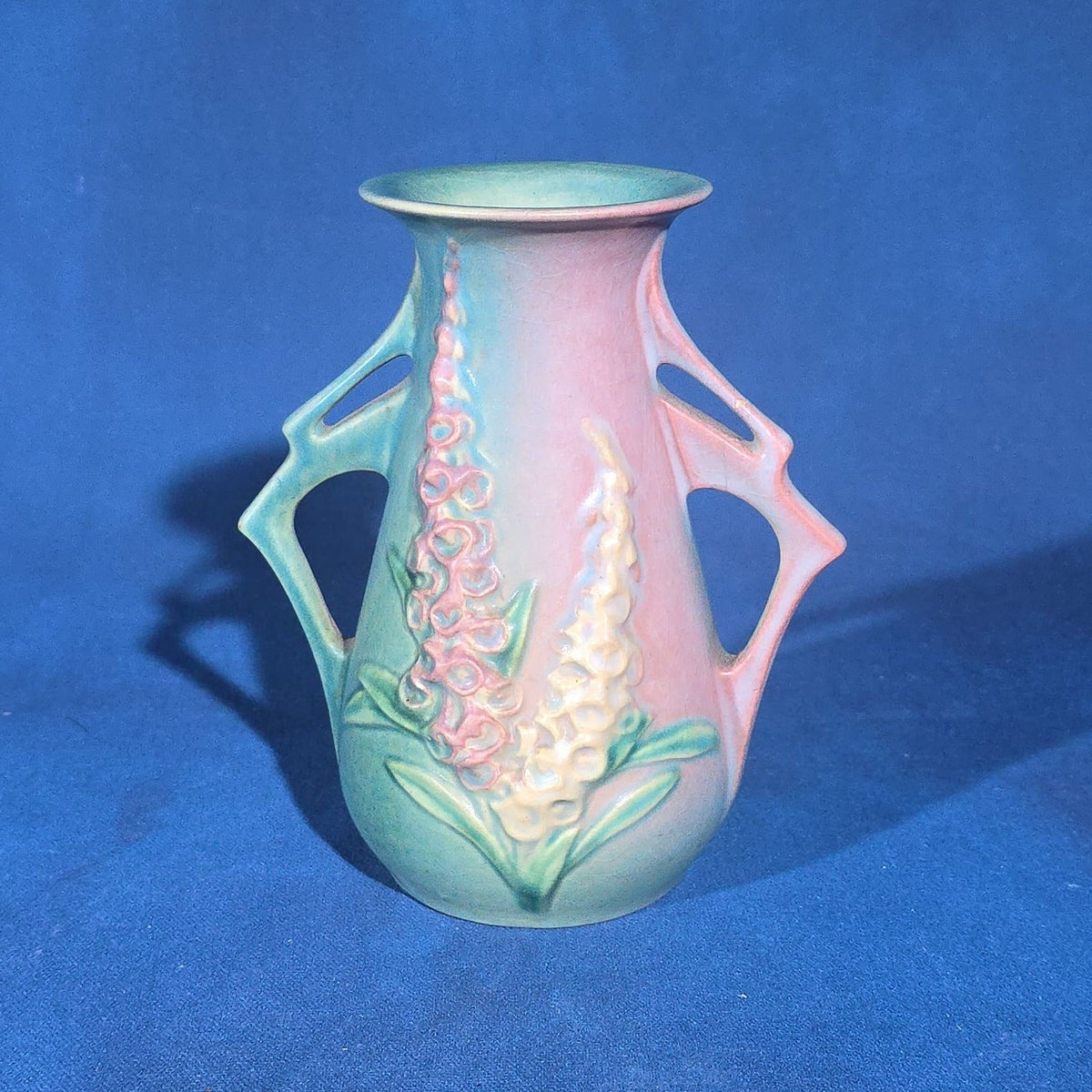 Trio of Vintage Roseville Pottery Pieces including Foxglove Vase 44-6", White Rose Ewer 981-6", and White Rose Vase 146-6", Chips to All Three