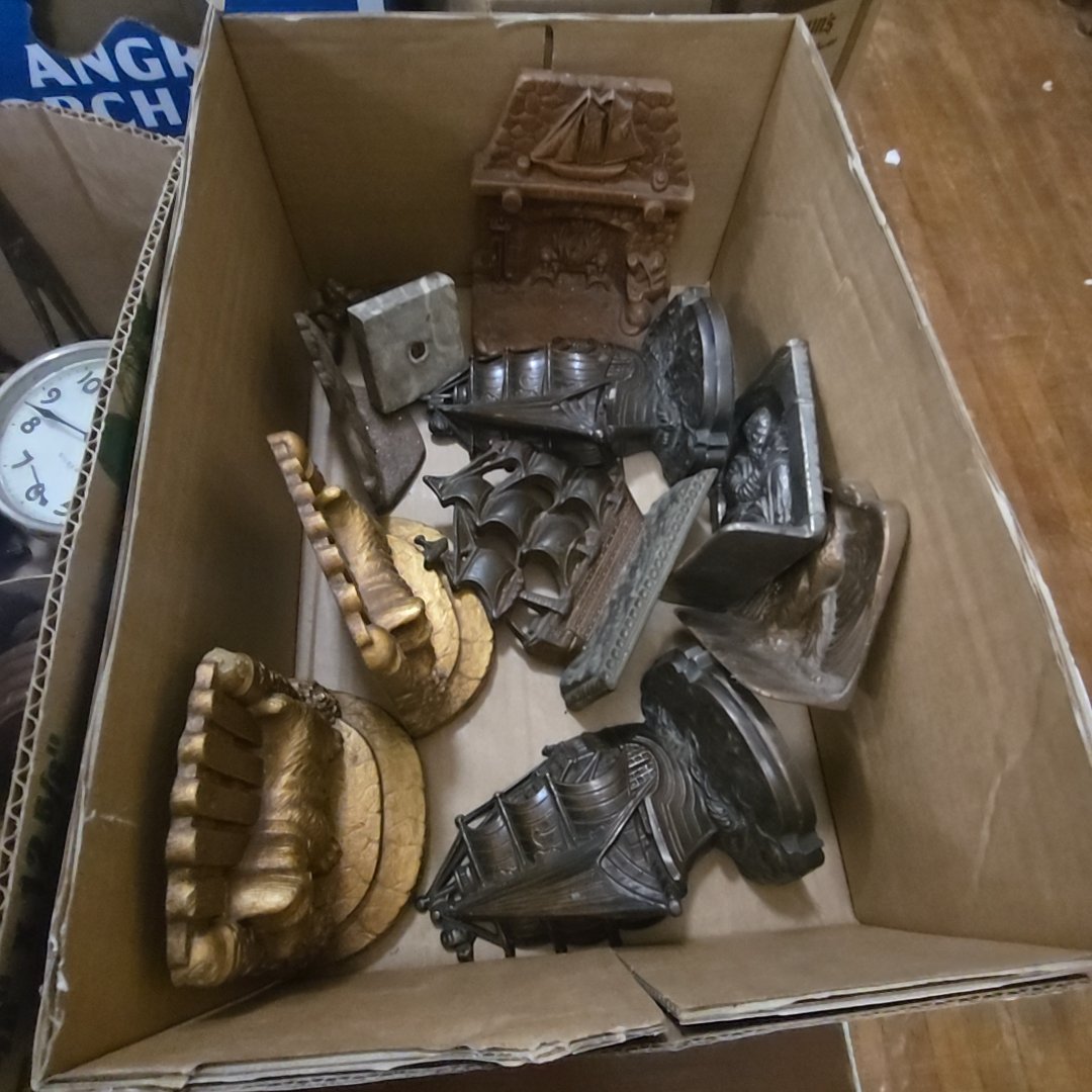 box lot of cast metal and other bookends