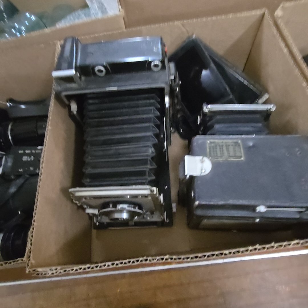 box lot with two folding cameras