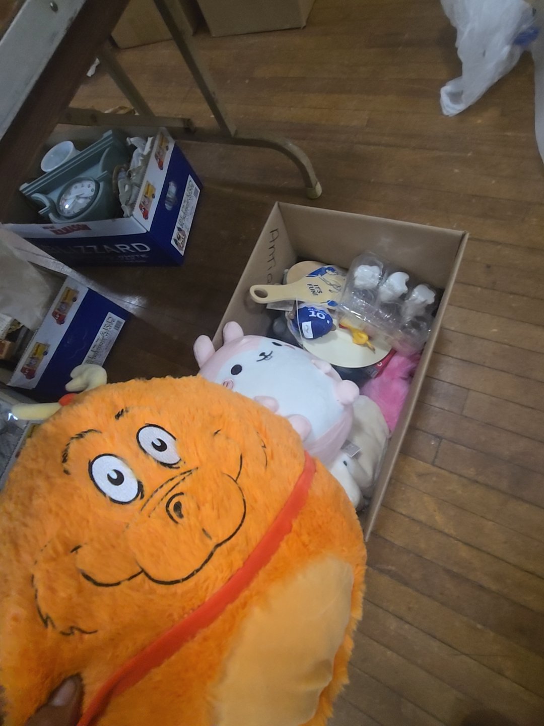 box of modern plush and toys