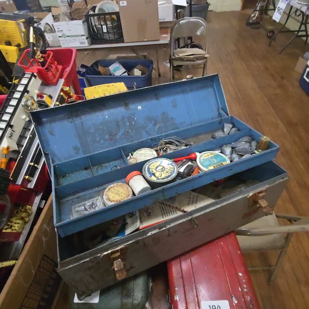 silver tackle box with contents