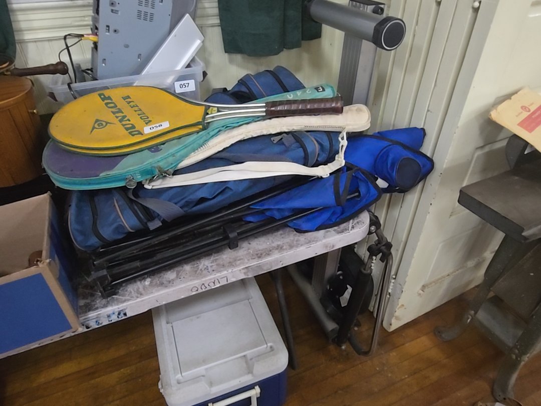 outdoor and athletic grouping with folding chair, duffle bags, step machine, tennis rackets, and cooler