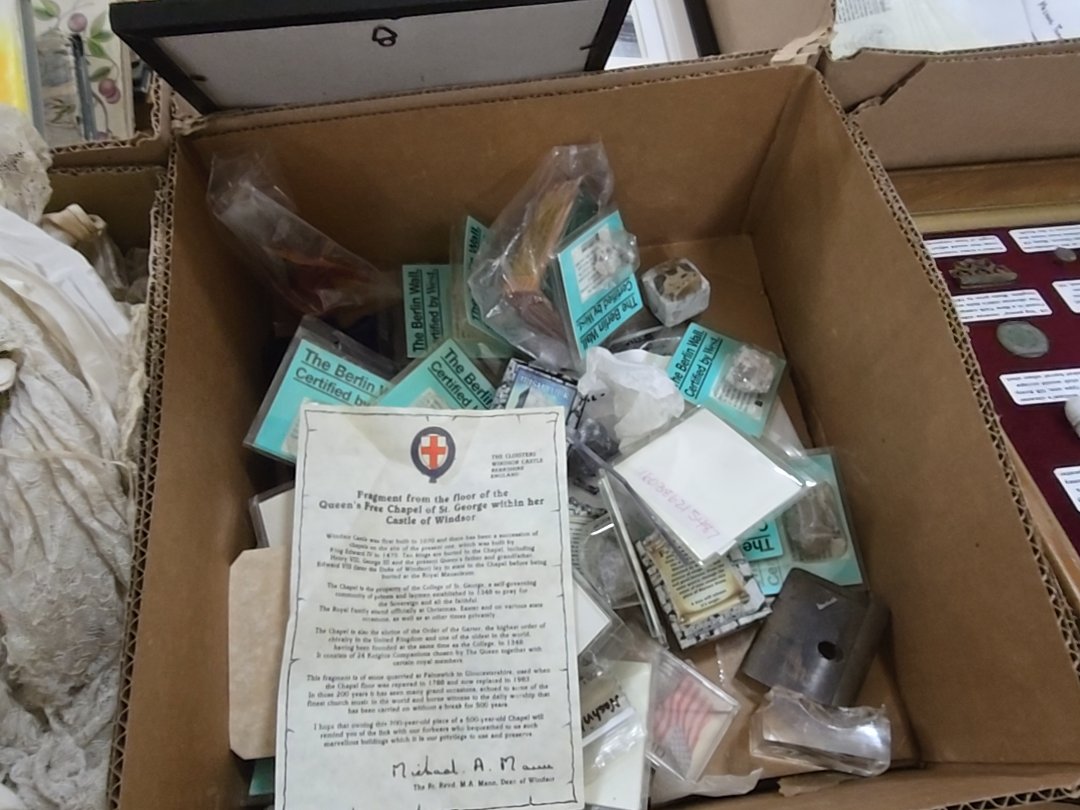 box lot of commemorative chunks of the Berlin wall and more