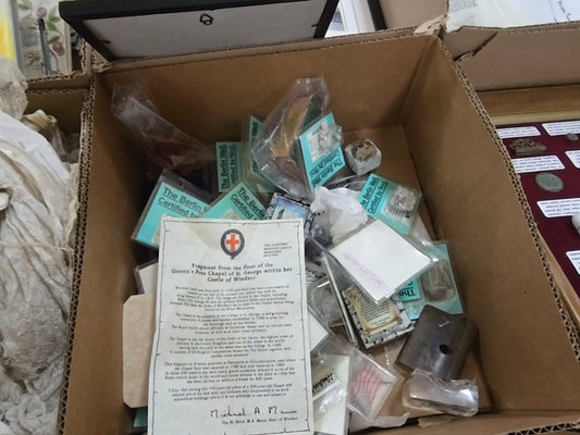 box lot of commemorative chunks of the Berlin wall and more