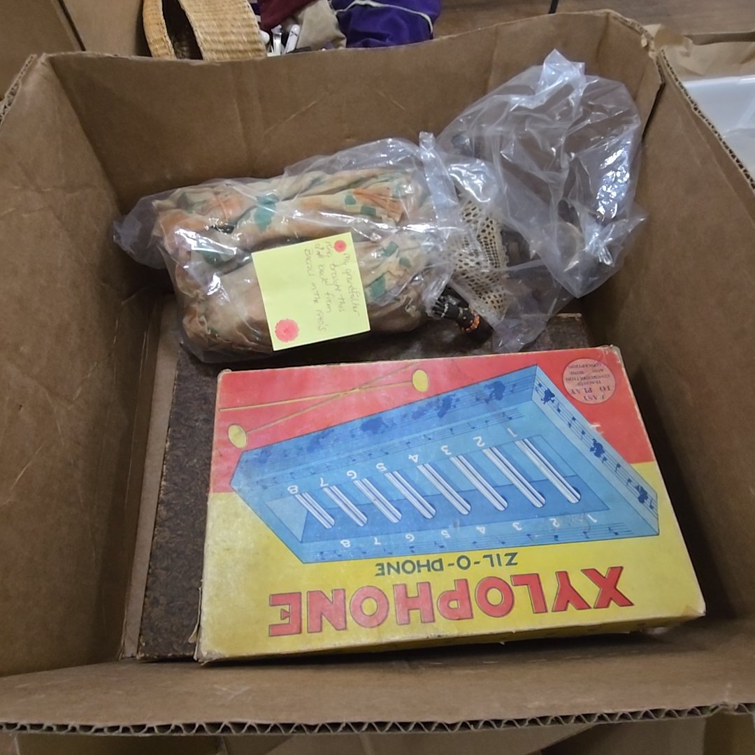 pair of games and Brazilian doll
