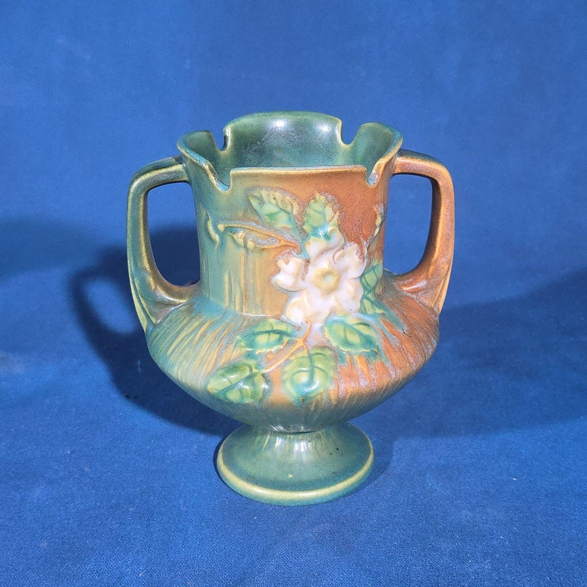 Trio of Vintage Roseville Pottery Pieces including Foxglove Vase 44-6", White Rose Ewer 981-6", and White Rose Vase 146-6", Chips to All Three