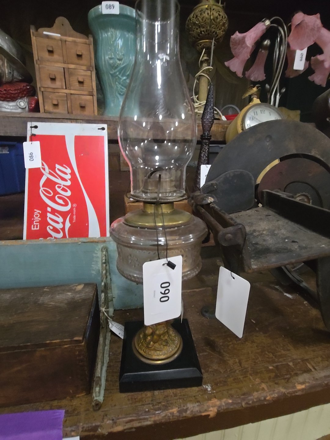 antique figural kerosene lamp