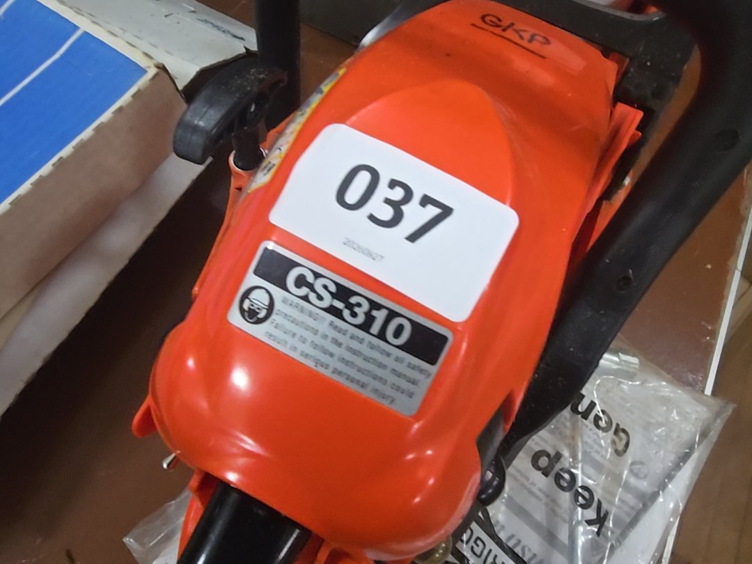 Echo cs-310 chainsaw with tools and bar and chain oil