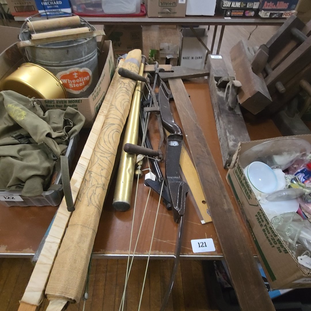 table grouping with baseball bat, bow, square, and fire tools