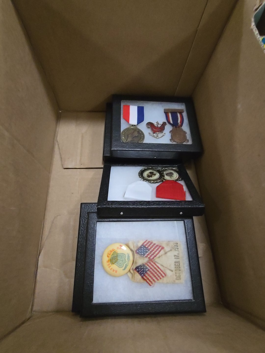 box lot with Riker cases containing medals including reproductions