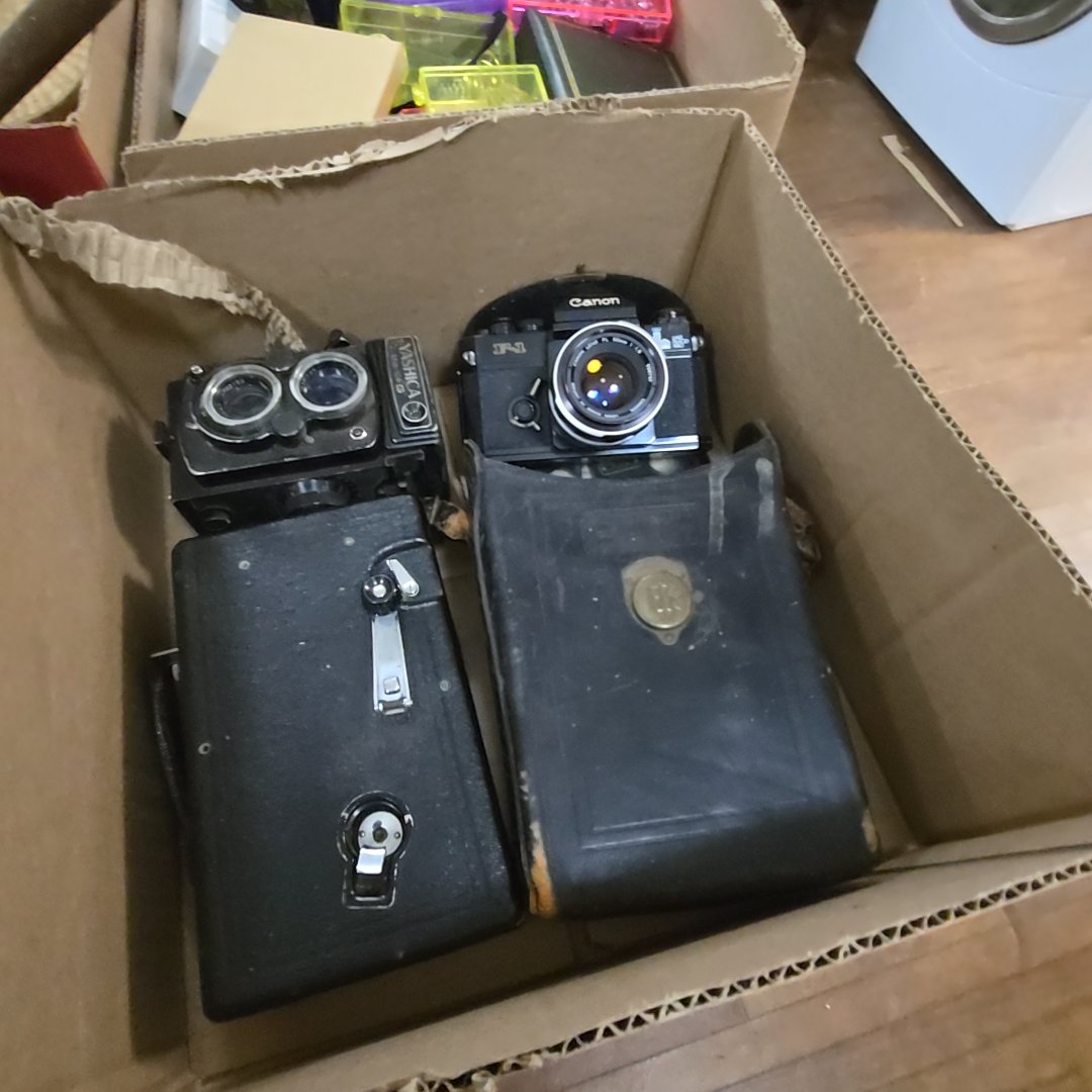 box lot of cameras including movie camera