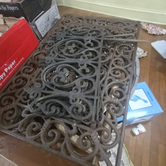 collection of modern and vintage decorative iron and wooden grates