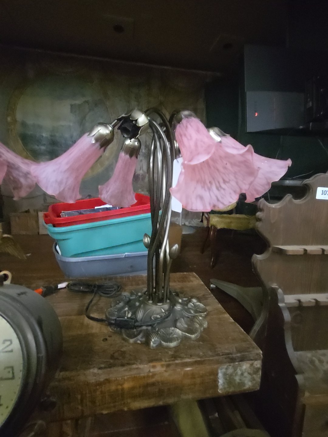 modern lamp with pink tulip shades, missing one shade