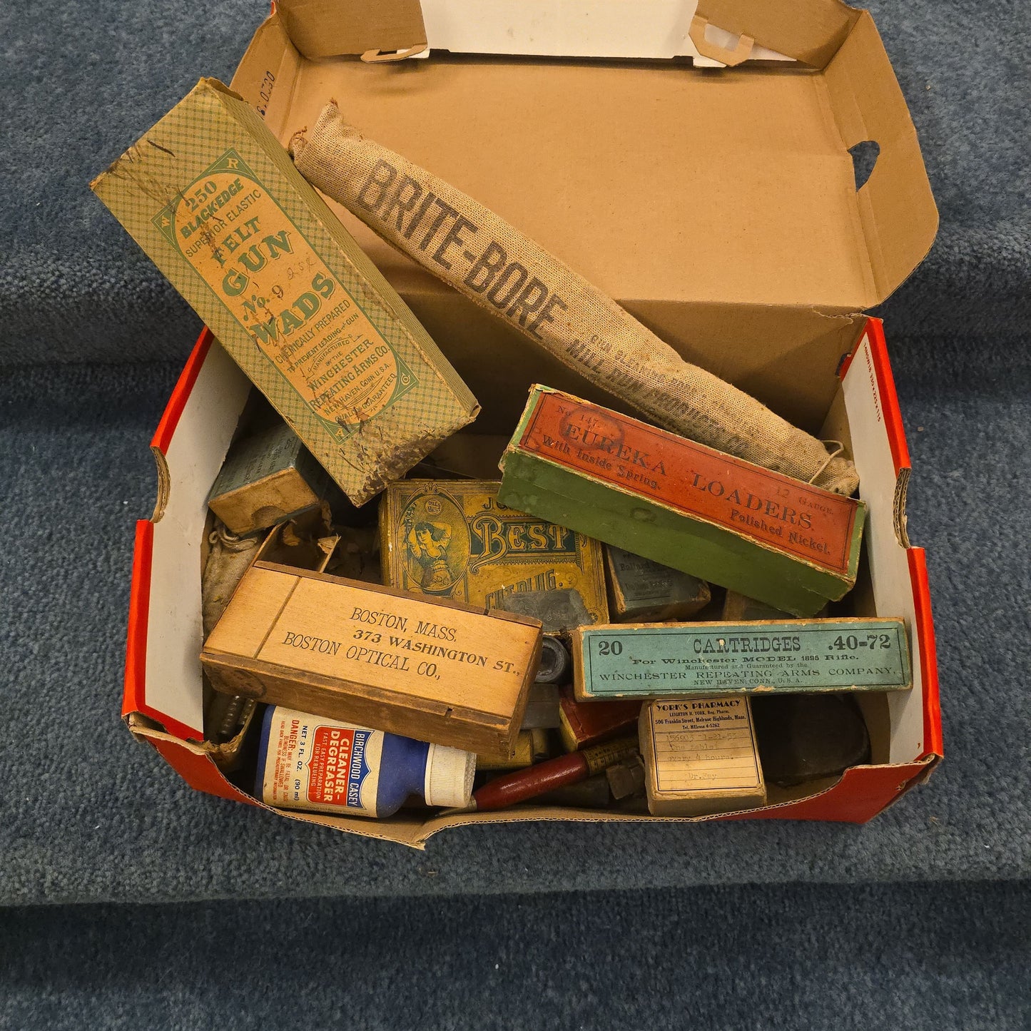 Grouping of Antique and Vintage Ammunition Boxes with Contents and Gun Accessories including Winchester .40-72 Cartridges for Model 1895, Union Metallic Cartridge Co. Ballard & Bullard Bullets, and Colt Grip Panel