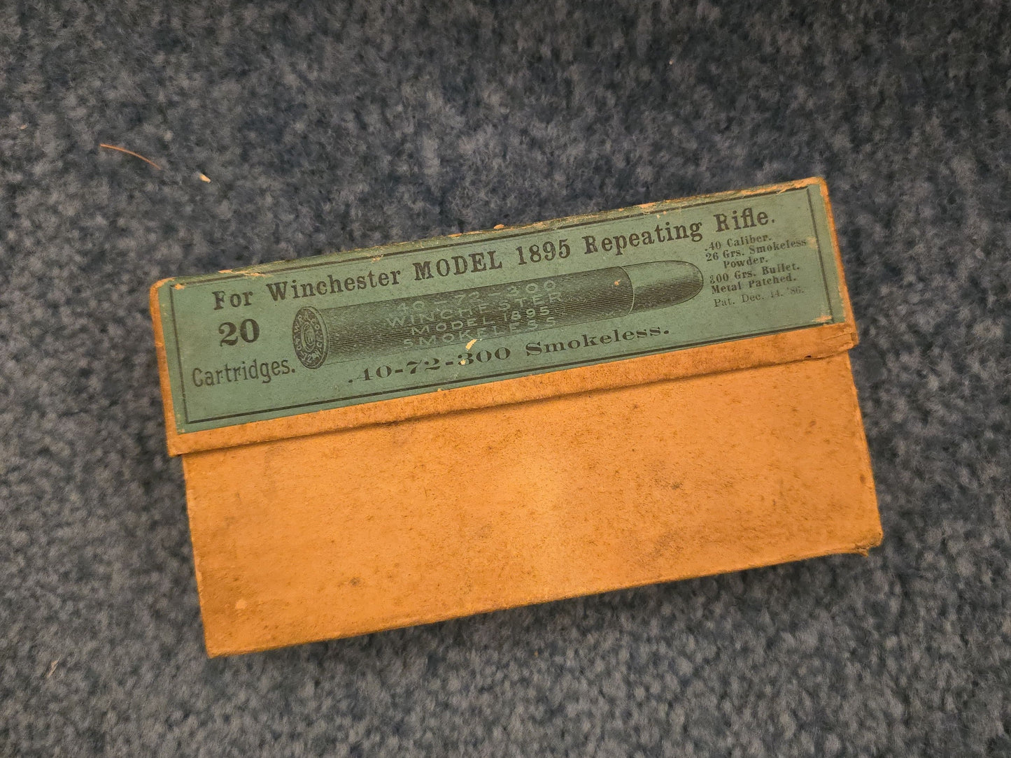 Grouping of Antique and Vintage Ammunition Boxes with Contents and Gun Accessories including Winchester .40-72 Cartridges for Model 1895, Union Metallic Cartridge Co. Ballard & Bullard Bullets, and Colt Grip Panel