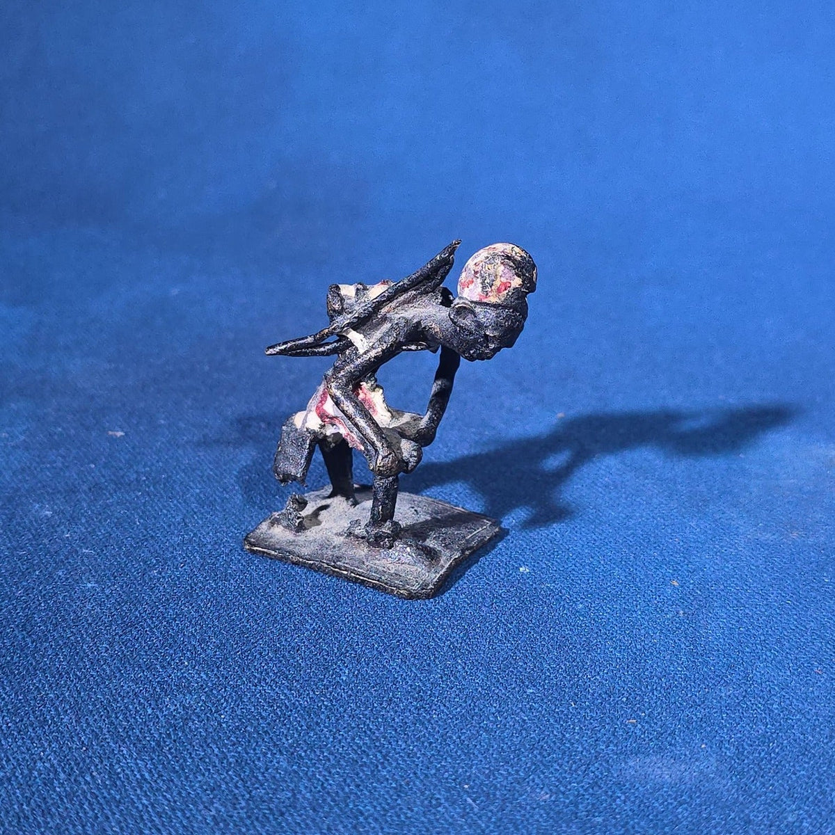 Grouping of 24 Vintage West African Iron Figurines with Painted Details and Provenance Note