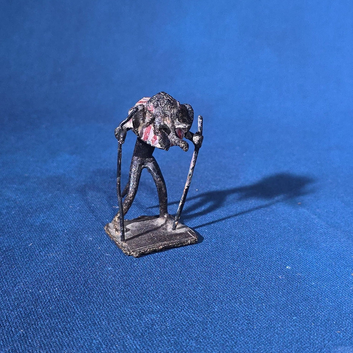 Grouping of 24 Vintage West African Iron Figurines with Painted Details and Provenance Note
