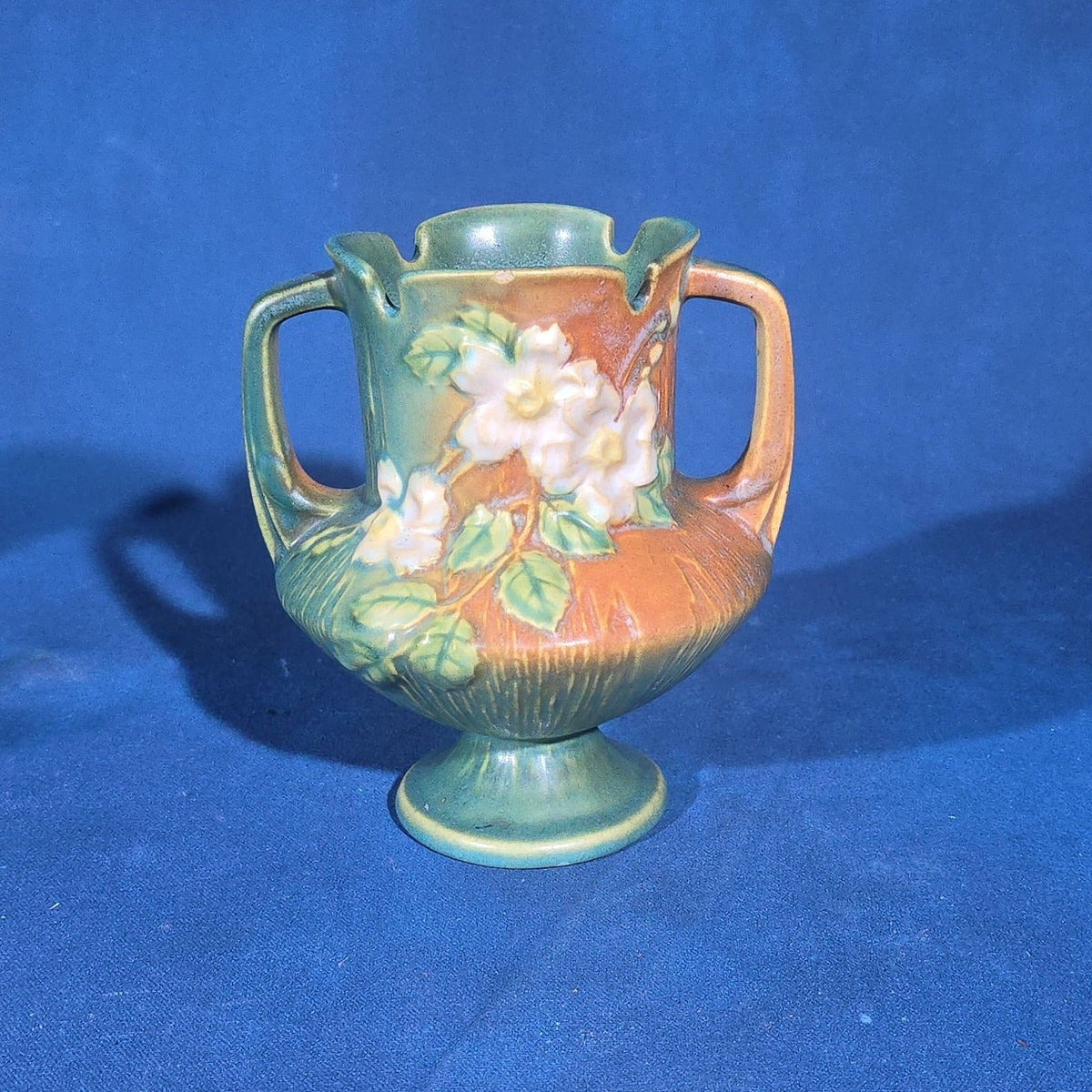 Trio of Vintage Roseville Pottery Pieces including Foxglove Vase 44-6", White Rose Ewer 981-6", and White Rose Vase 146-6", Chips to All Three