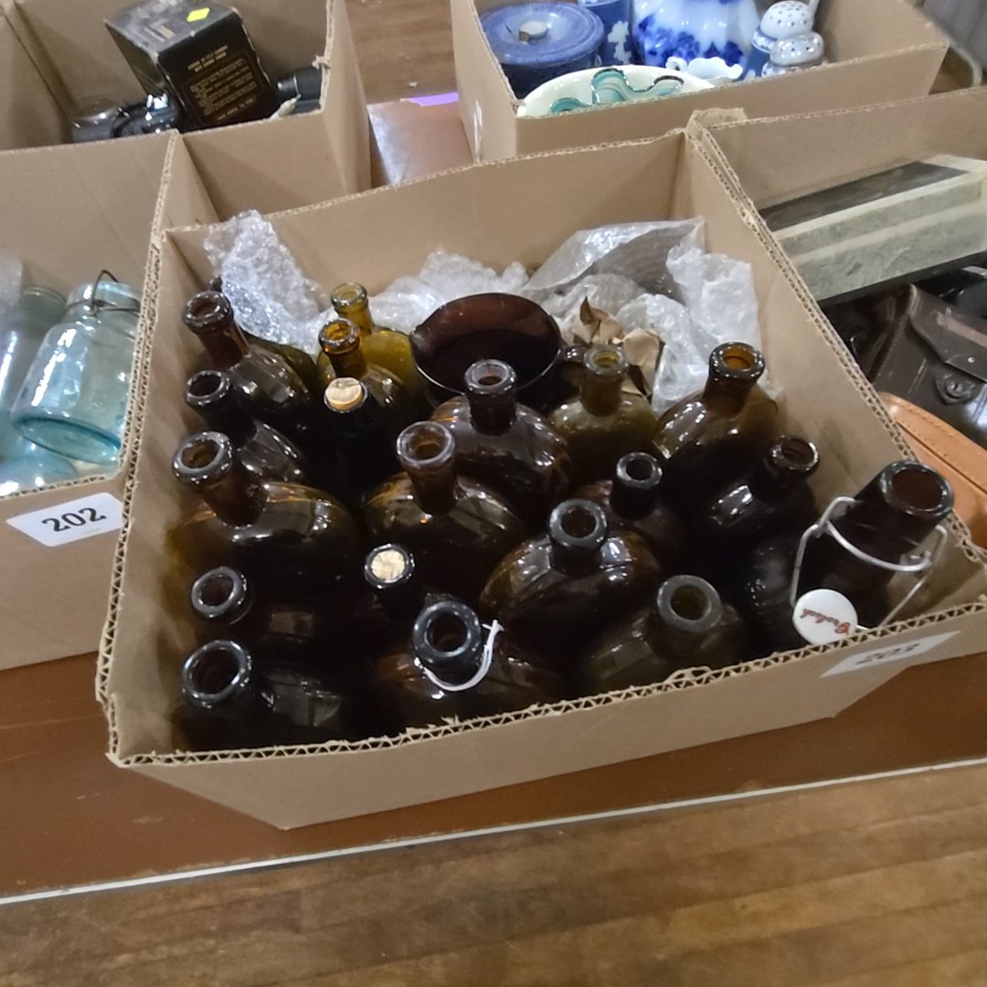 box lot with amber glass bottles