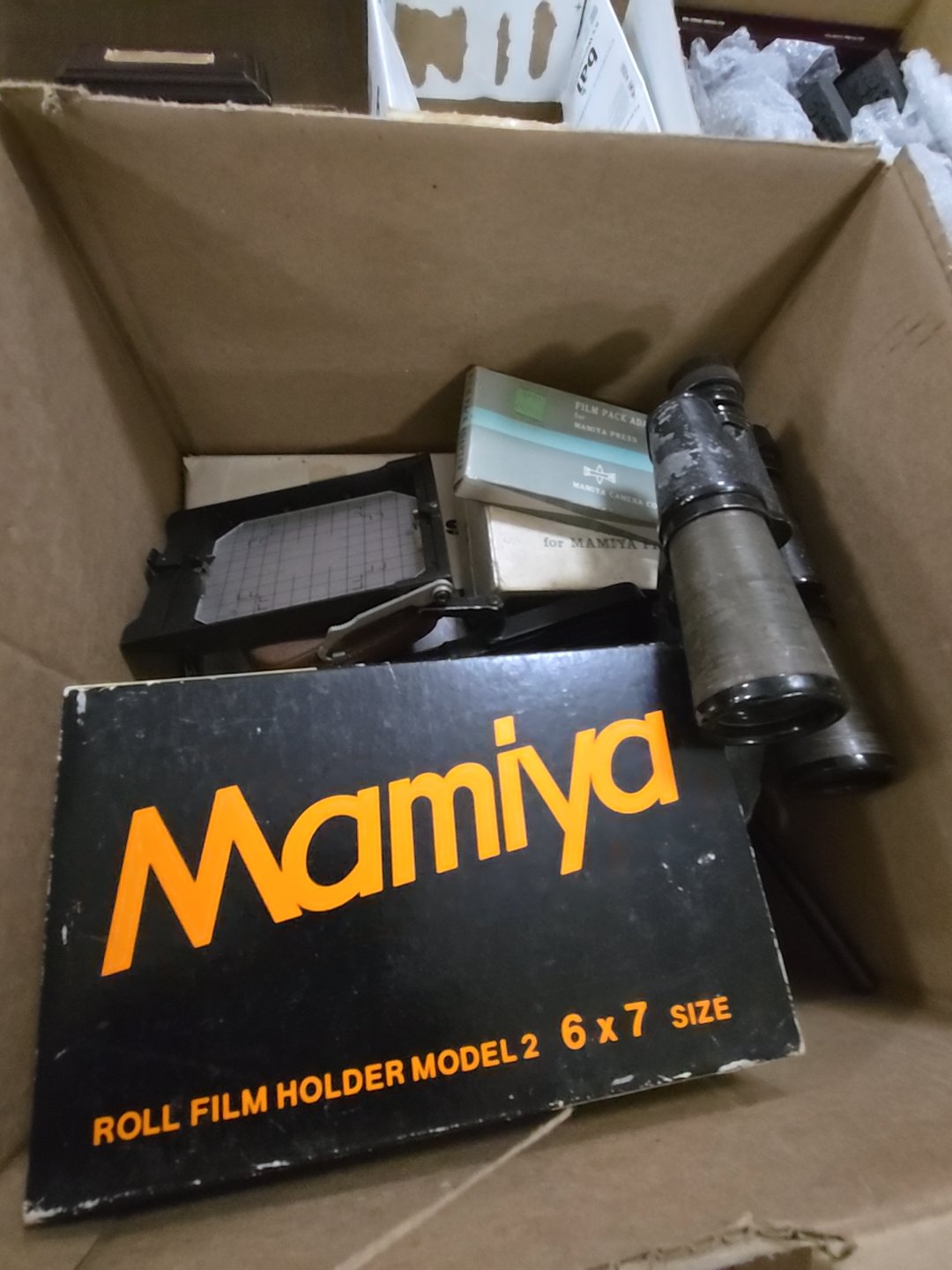 box lot of camera equipment