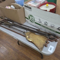 Lot 145 - Table Lot with Fire Tools and Cast Iron Piece