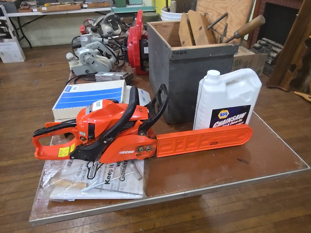 Echo cs-310 chainsaw with tools and bar and chain oil