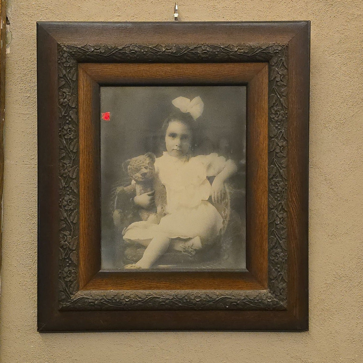Antique Framed Photograph of a Young Girl with a Teddy Bear in Carved Oak Frame