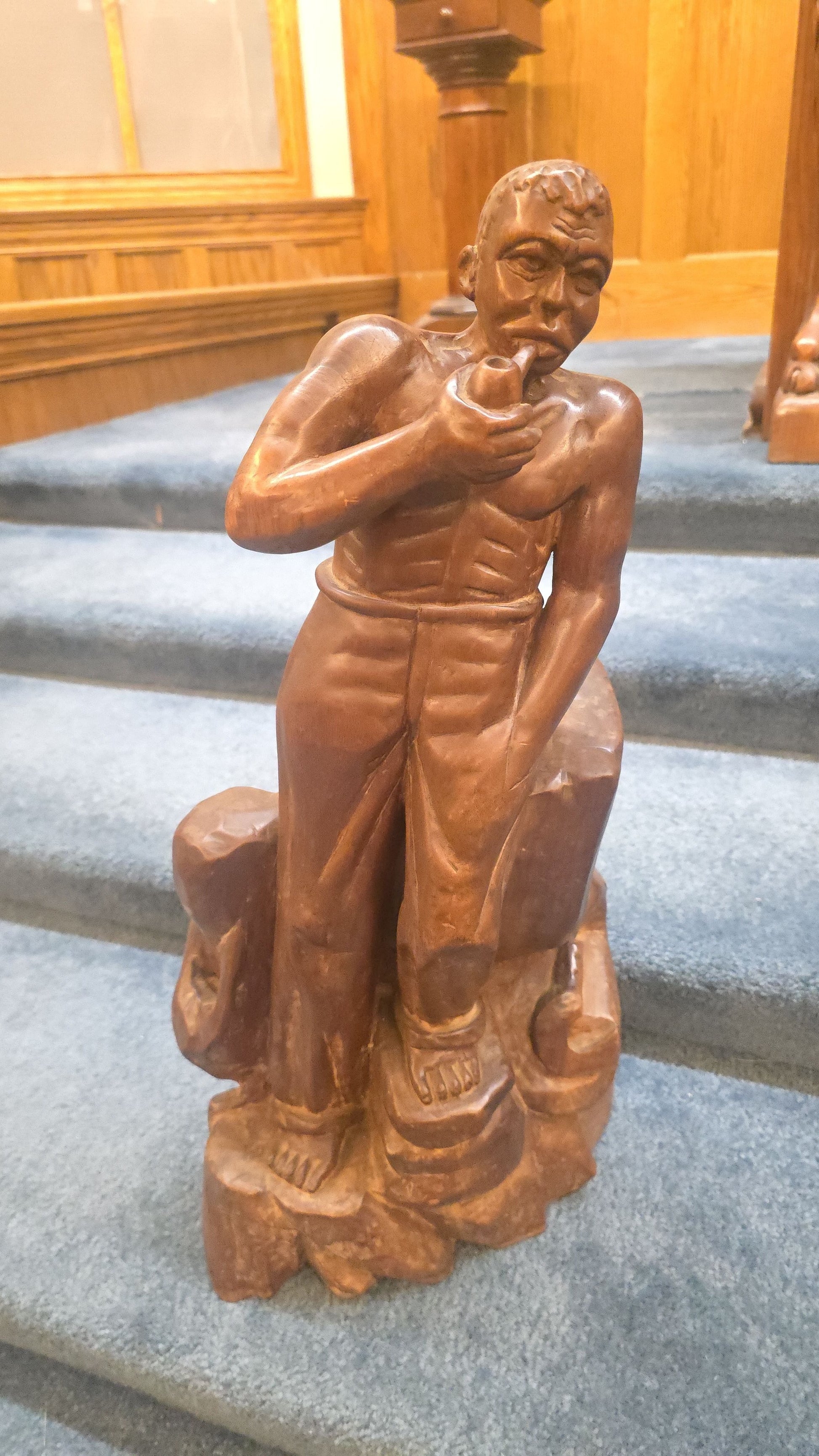 Vintage Haitian Carved Wood Figure of a Seated Man Smoking a Pipe, Signed Numa Germain