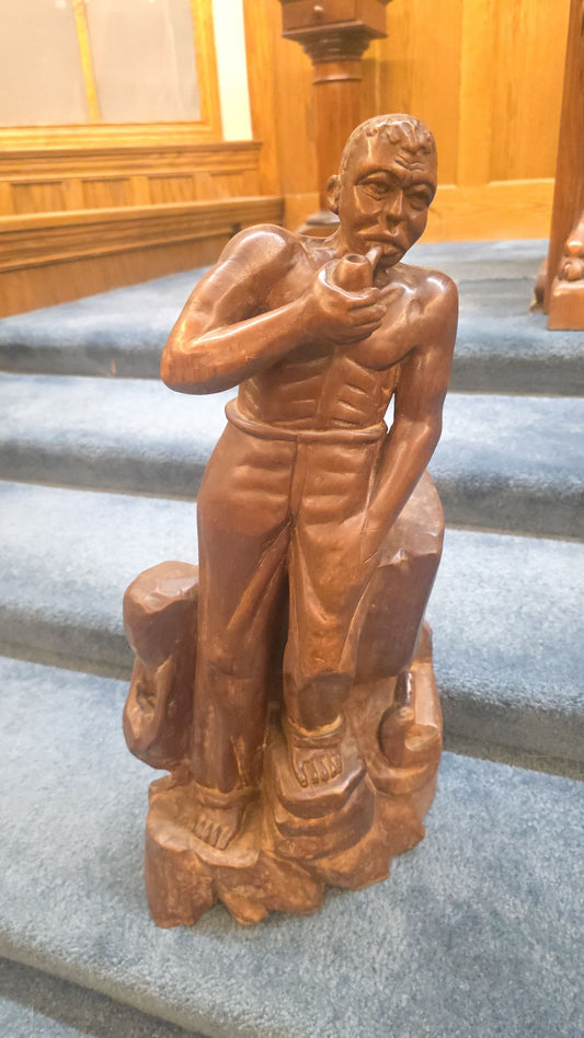 Vintage Haitian Carved Wood Figure of a Seated Man Smoking a Pipe, Signed Numa Germain