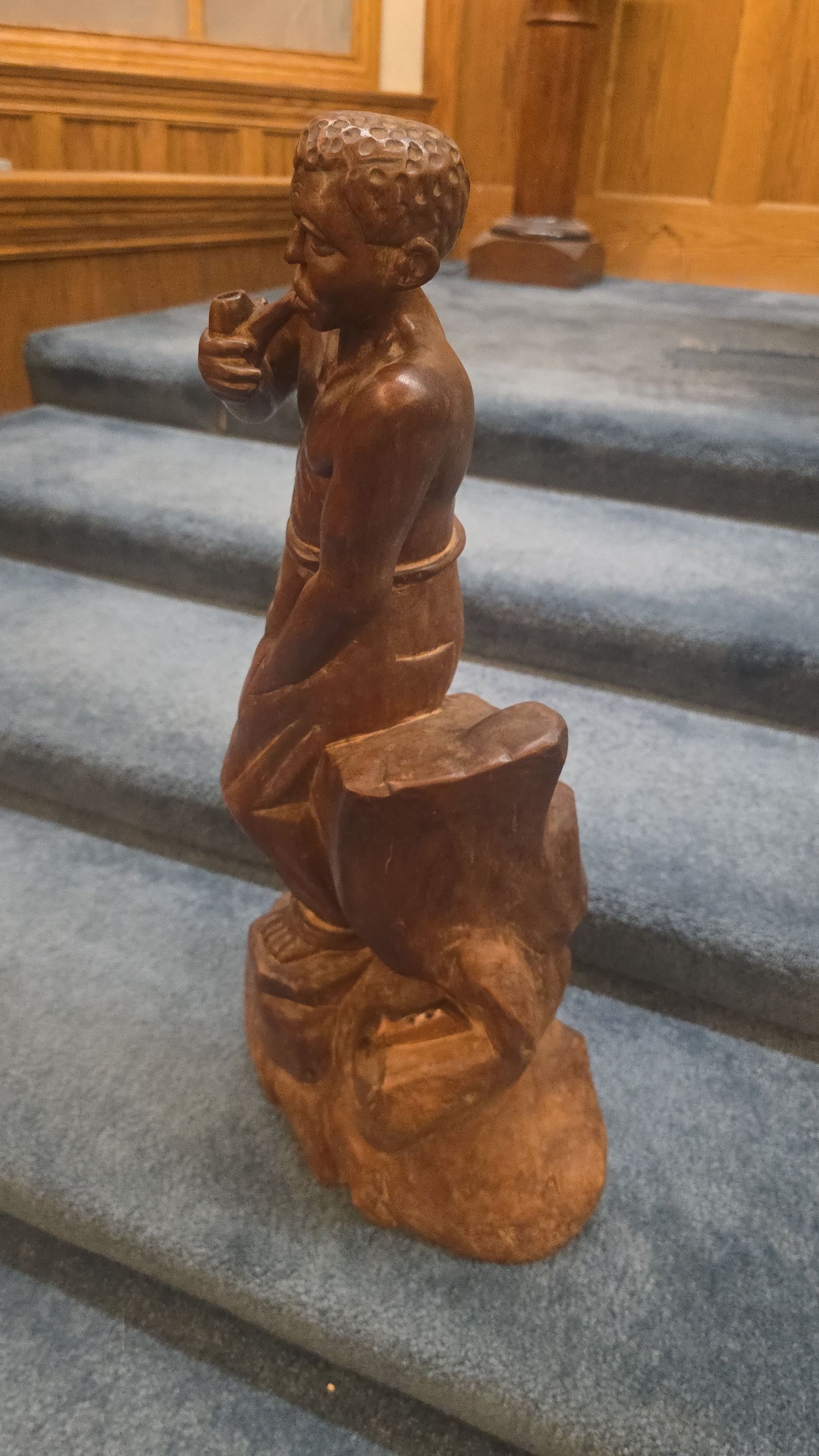 Vintage Haitian Carved Wood Figure of a Seated Man Smoking a Pipe, Signed Numa Germain