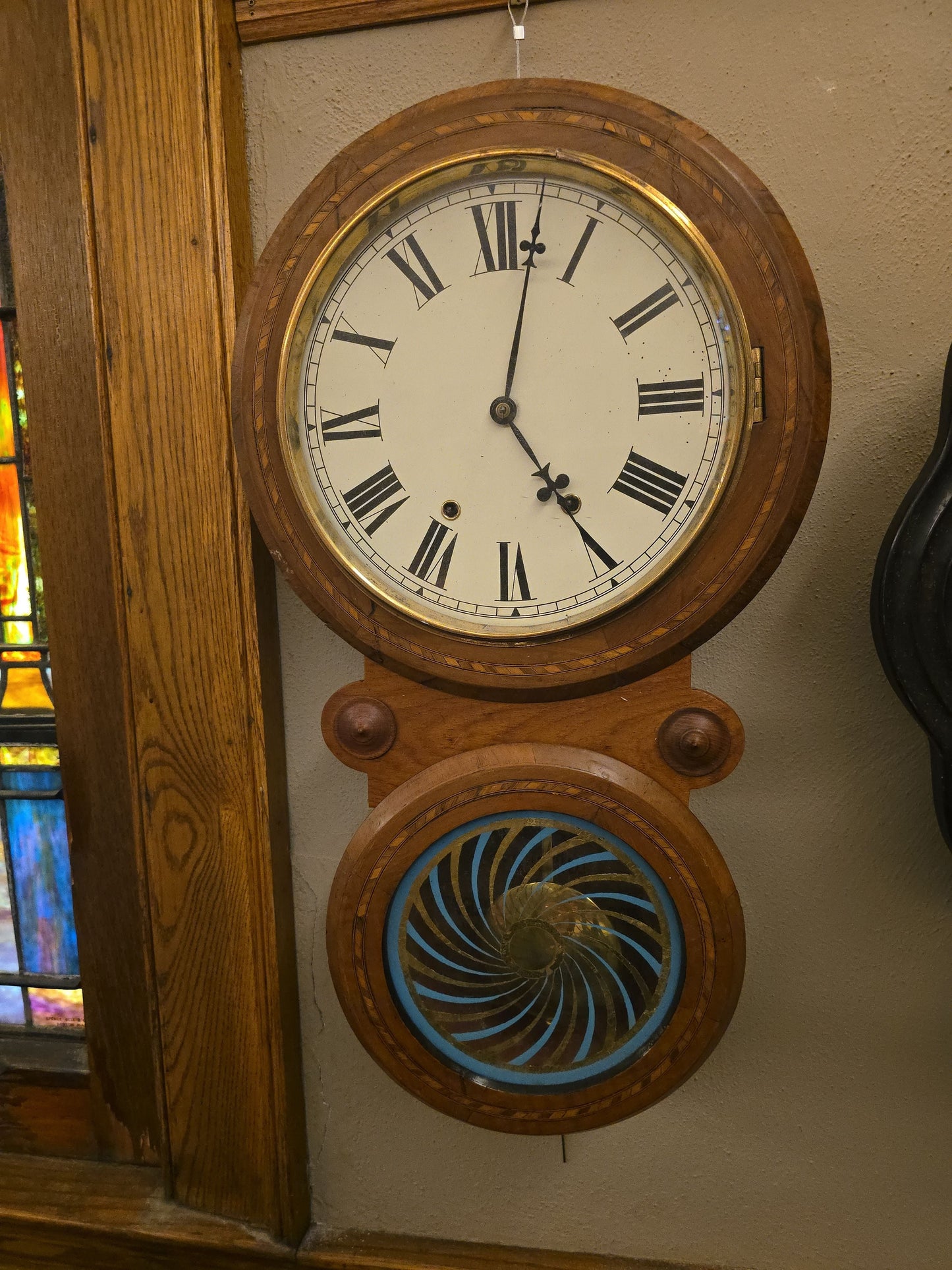Vintage Eight-Day Figure-Eight Wall Clock with Inlaid Case and Reverse-Painted Pendulum Glass