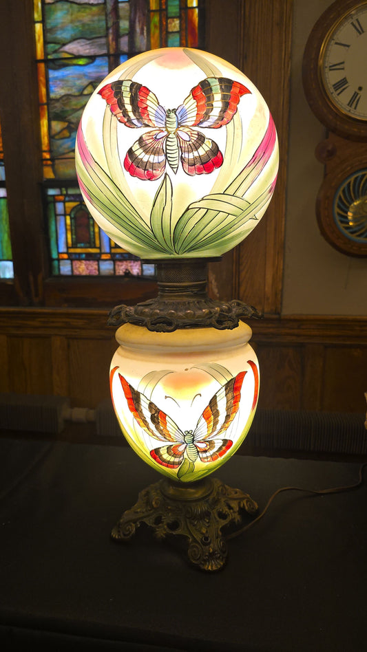 Antique Electrified Hand-Painted Glass Globe Parlor Lamp with Butterfly and Foliage Decoration on Cast Metal Base