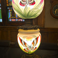 Lot 123 - Antique Electrified Hand-Painted Glass Globe Parlor Lamp with Butterfly and Foliage Decoration on Cast Metal Base, 9-1/2" L x 24-3/4" H