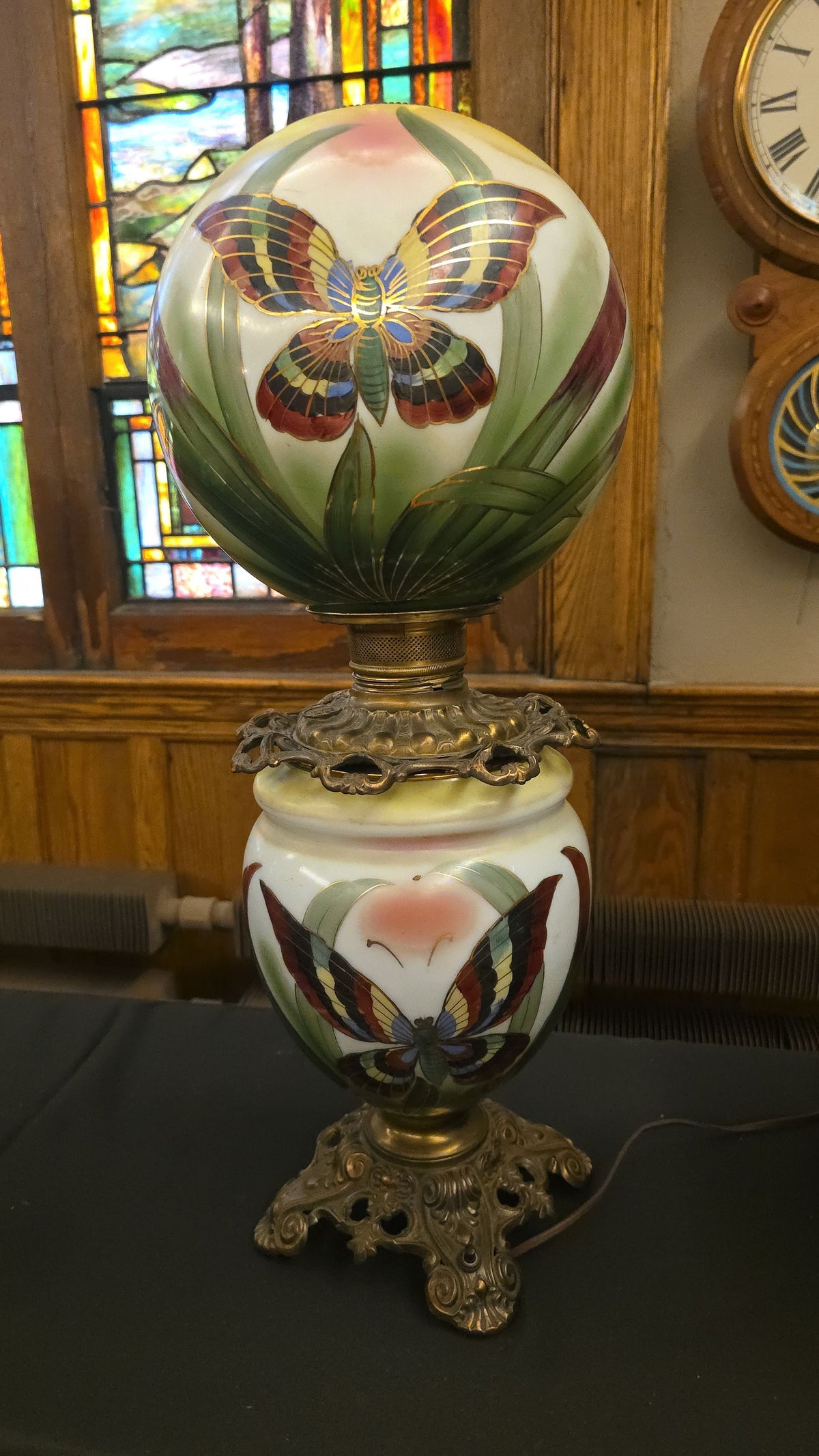 Antique Electrified Hand-Painted Glass Globe Parlor Lamp with Butterfly and Foliage Decoration on Cast Metal Base