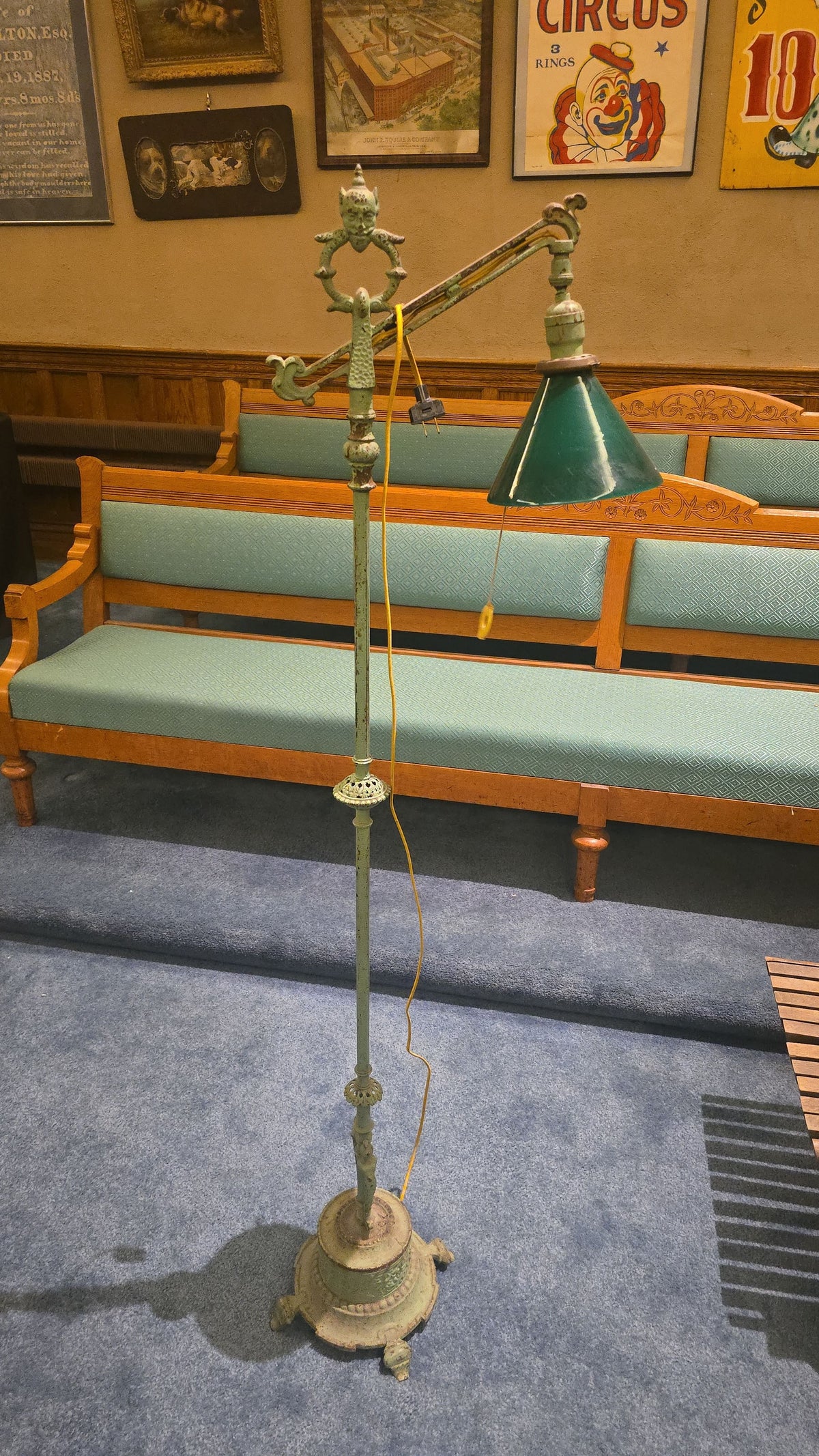 Antique Cast Iron Bridge Arm Floor Lamp with Figural Devil Face Finial and Green Cone Shade
