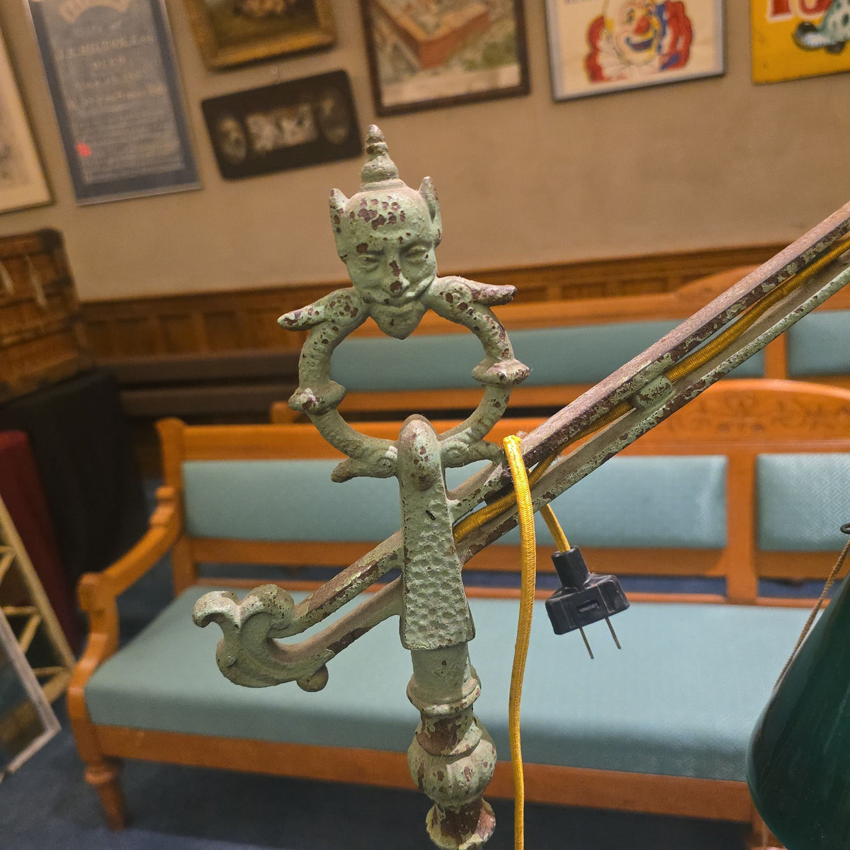 Antique Cast Iron Bridge Arm Floor Lamp with Figural Devil Face Finial and Green Cone Shade